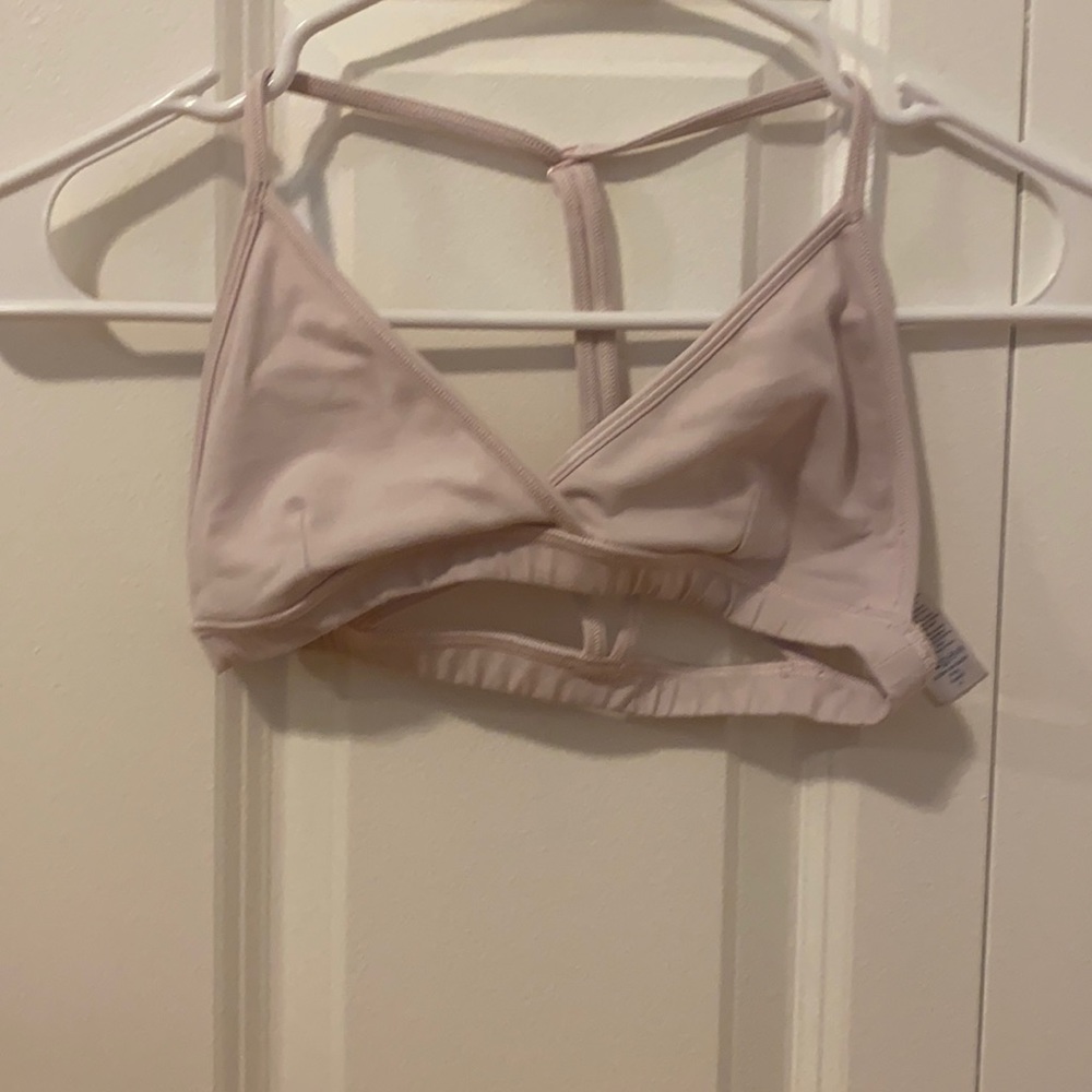 light pink ivivva sports bra